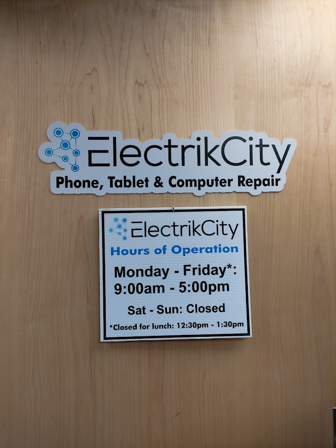 ElectrikCity storefront sign — phone, tablet and computer repair in Athabasca